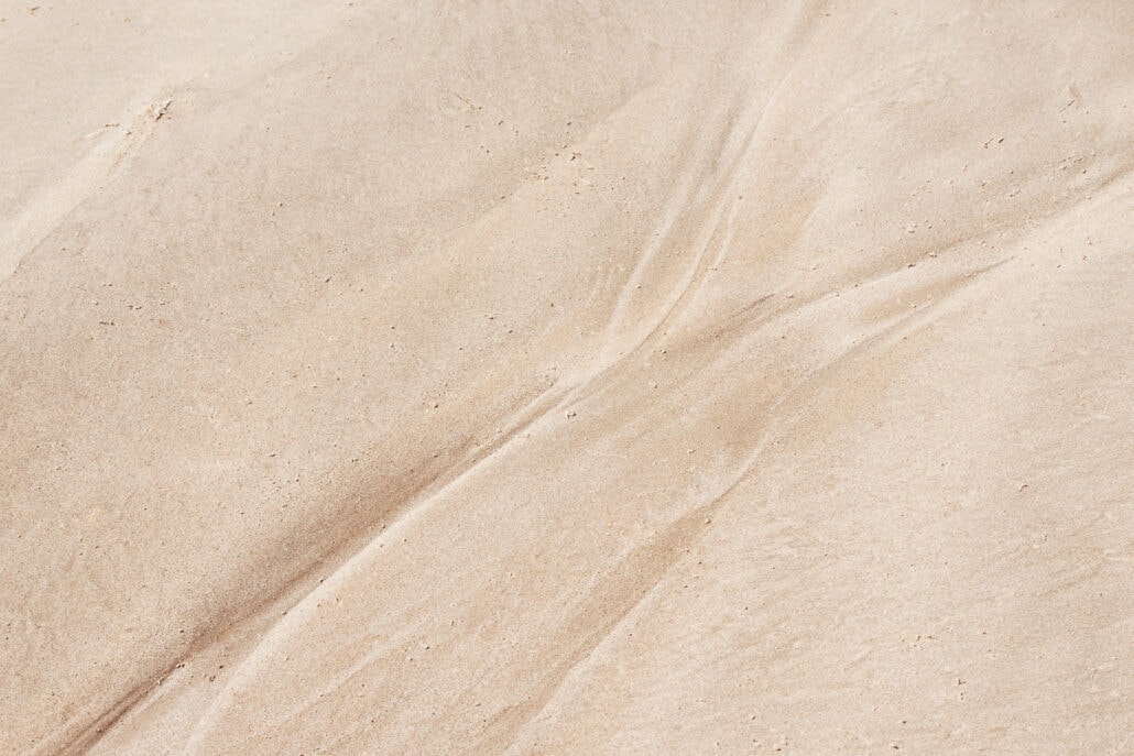 Showable Art - patterns left on sand by the surf and tide.