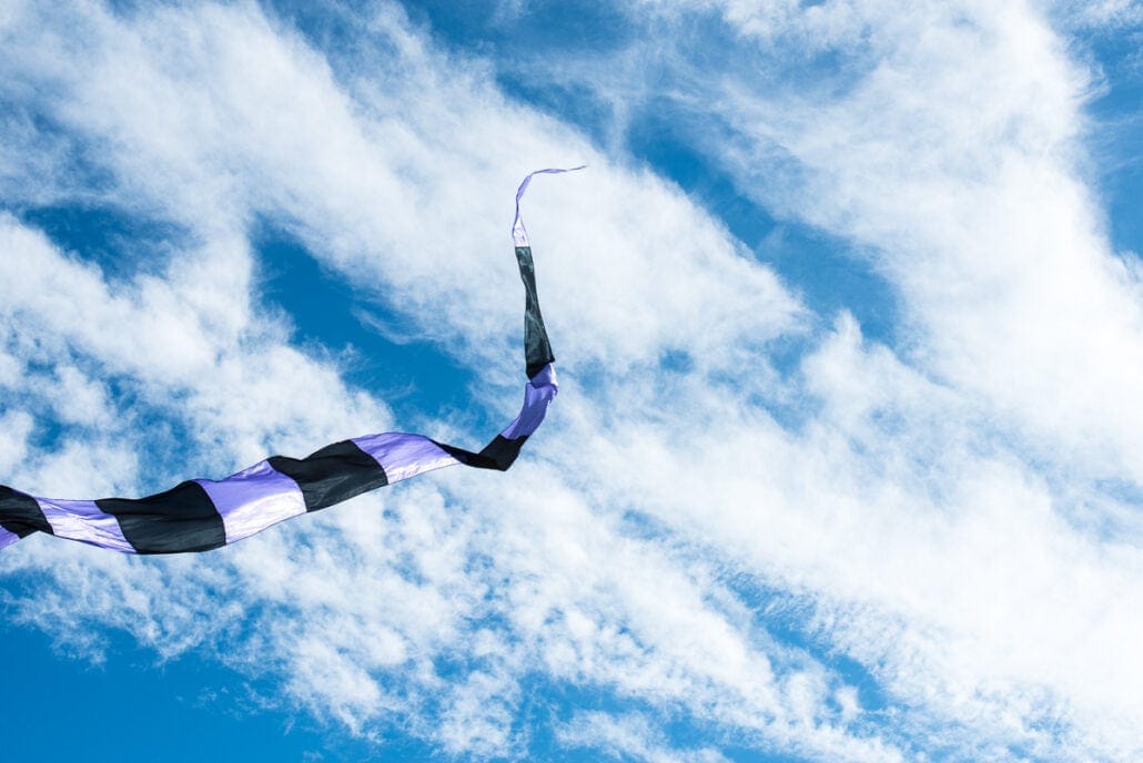 Kite flying on the Texas coast, Kite Tails #0253, photograph by Jeff Kauffman
