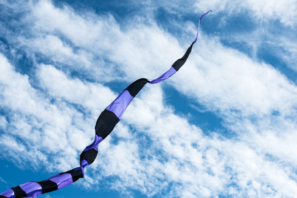 Kite flying on the Texas coast, Kite Tails #0259, photograph by Jeff Kauffman