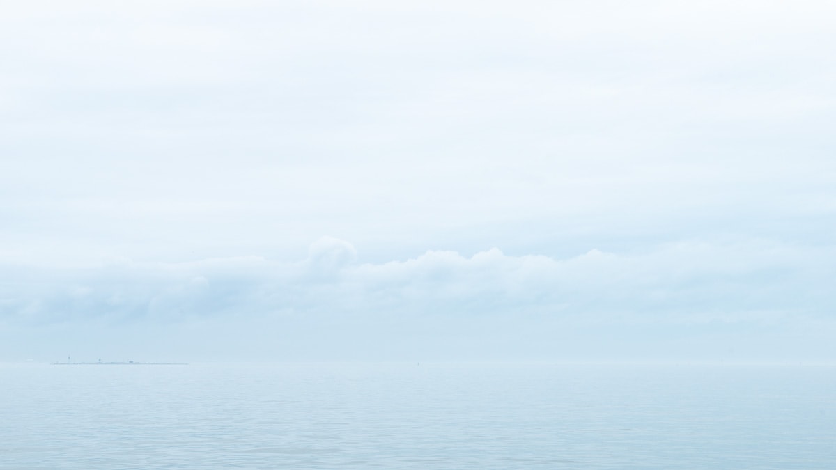 Wide Open Space, Fog Bank #0251. haze rain and fog envelop Galveston Bay. Photograph by Jeff Kauffman.