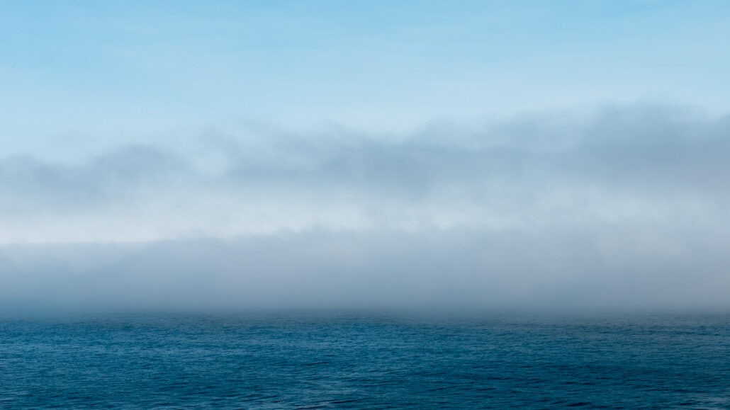 Having a Nature Bath, River of Fog #0853. The river of fog on the central coast of California begins to lift. Photograph by Jeff Kauffman.