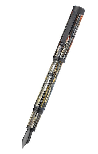Photo showing the ZERO Meteor Shower fountain pen by Montegrappa. The background is white. The pen is multi colored representing the streaks of light made my meteors in the night sky.