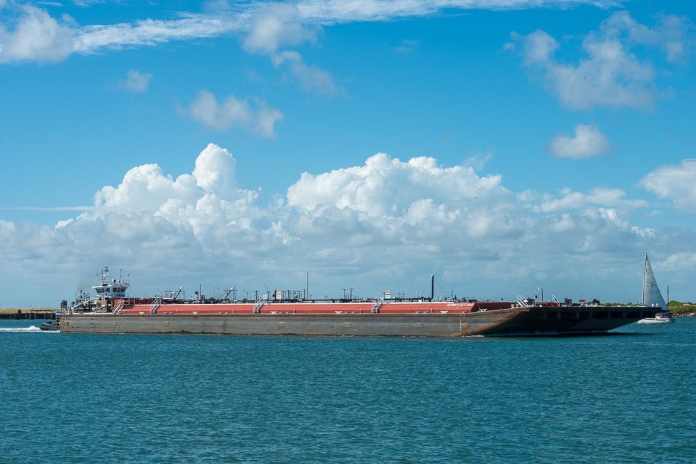 A barge moves through the Port Aransas Ship Channel. Photo ©Jeff Kauffman
